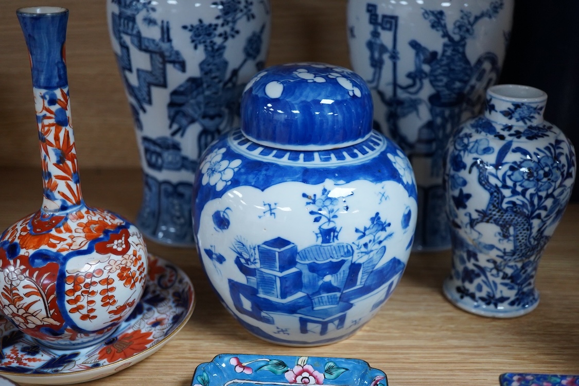 A pair of Chinese blue and white vases and covers and three other items, together with Japanese ceramics, cloisonné and Canton enamelware (11)
